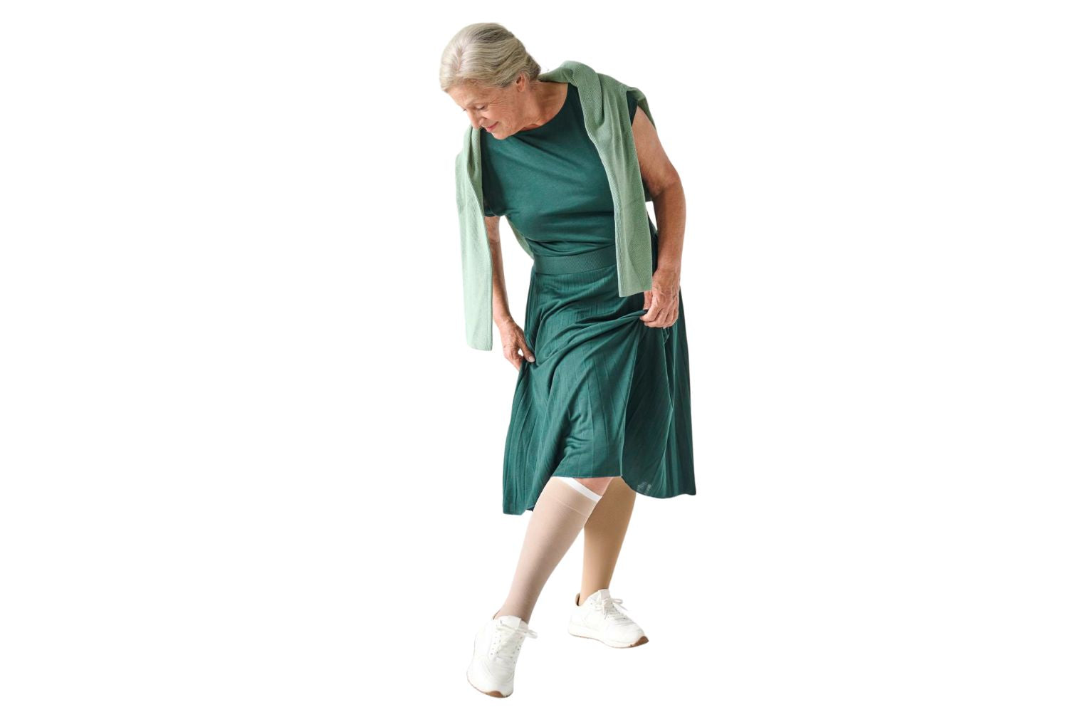 woman looking at the VenoTrain Ulcertec sock she is wearing