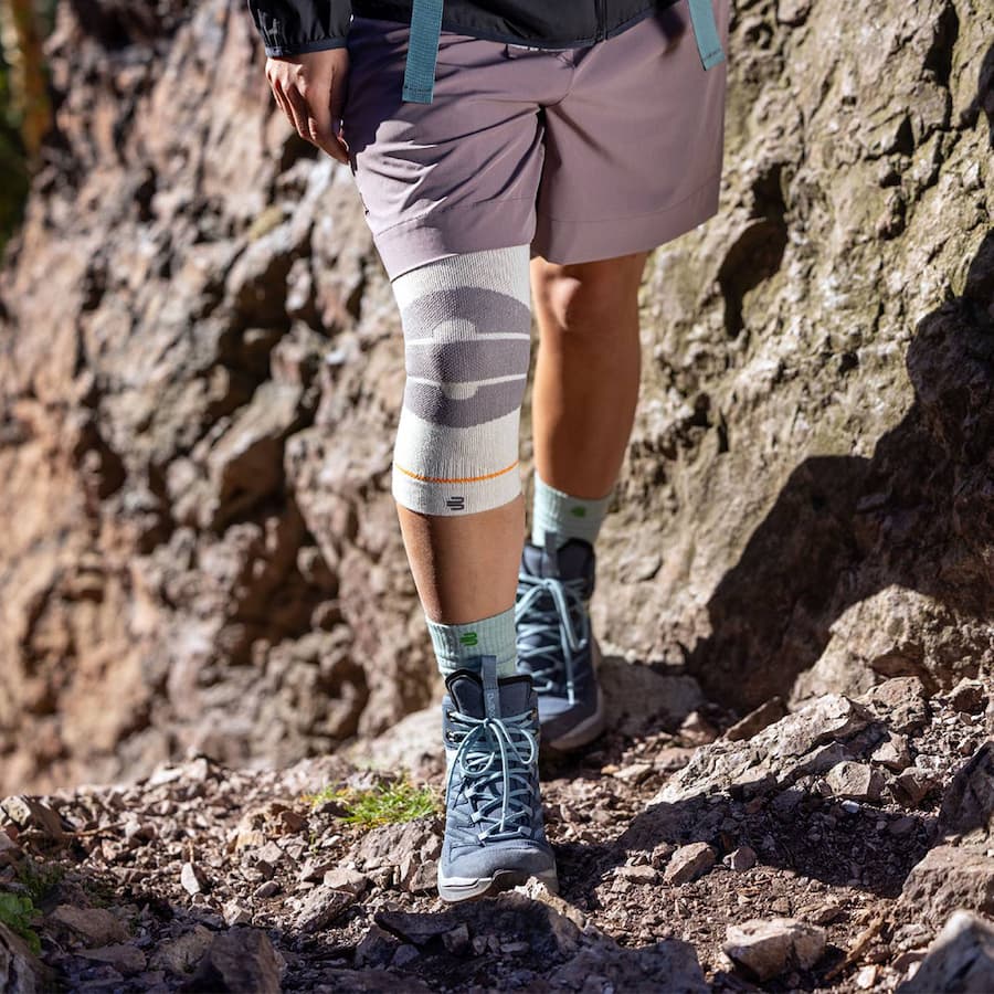 a woman hiking wearing a Sports Compression Knee Sleeve Pro