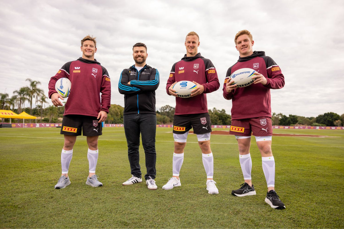 Walid Yassine, Managing Director of Bauerfeind, with Tom Dearden, Daly Cherry-Evans and Harry Grant of the Queensland Marrons