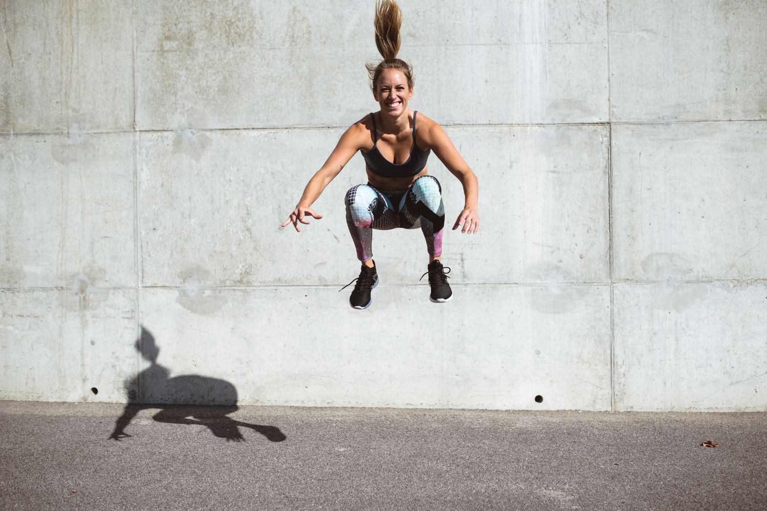 Woman doing jump squats
