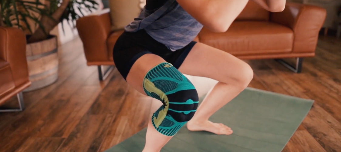 Lucia performing Bodyweight squats in Baerfeind's Sports Knee Brace