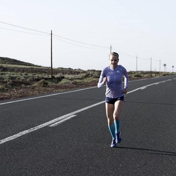 Image of person wearing Bauerfeind compression socks while running