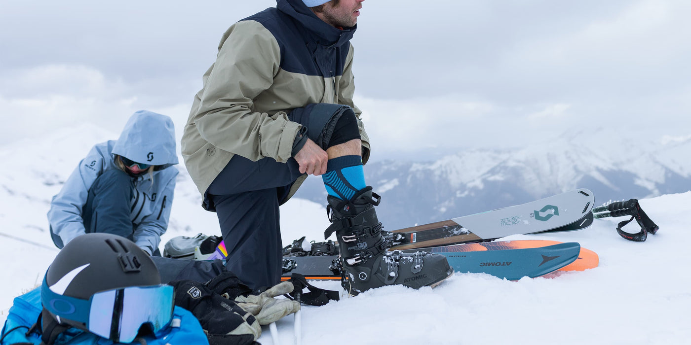 A man skiing wearing Bauerfeind compression socks